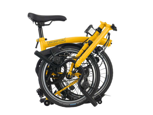 Brompton C Line Explore Hoog met Rack  Season 2023 Hommel Geel